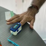 Temperature and Oxygen saturation checks of all patients.